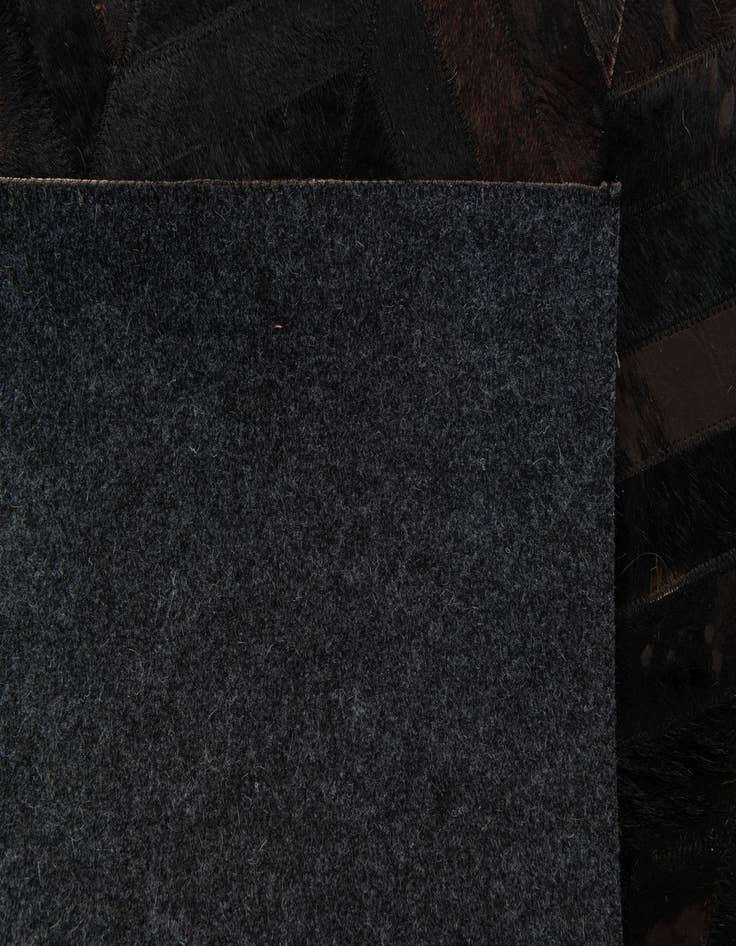 Detail image of  6' x 8' 10 Cowhide Stocks Rug