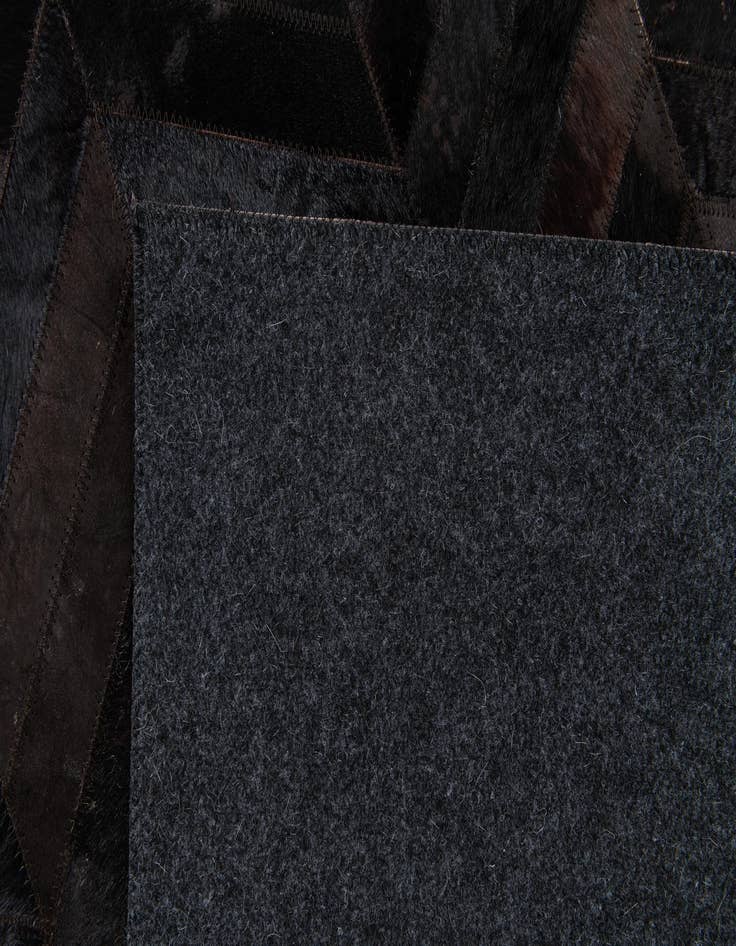 Detail image of  6' x 9' Cowhide Stocks Rug