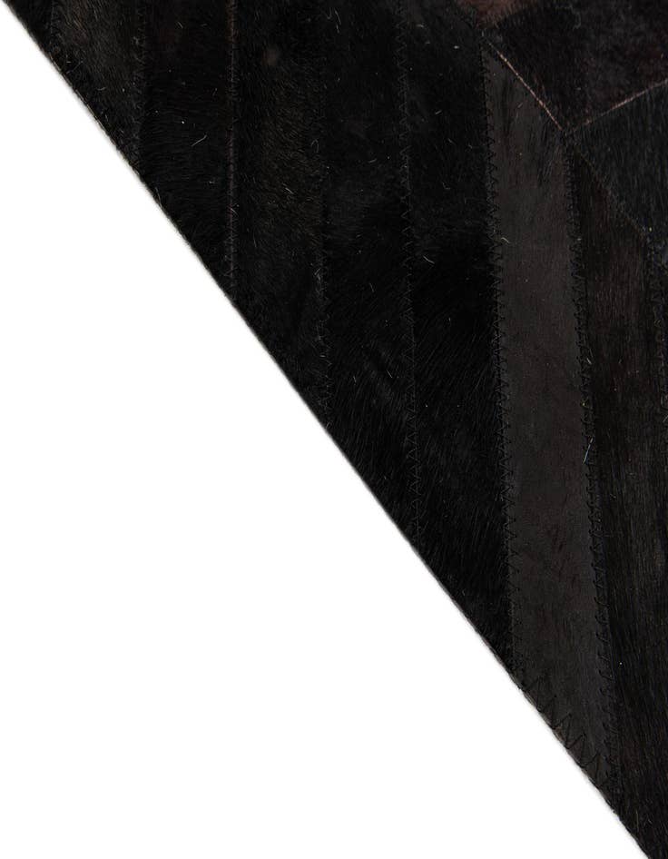 Detail image of  6' x 8' 11 Cowhide Stocks Rug