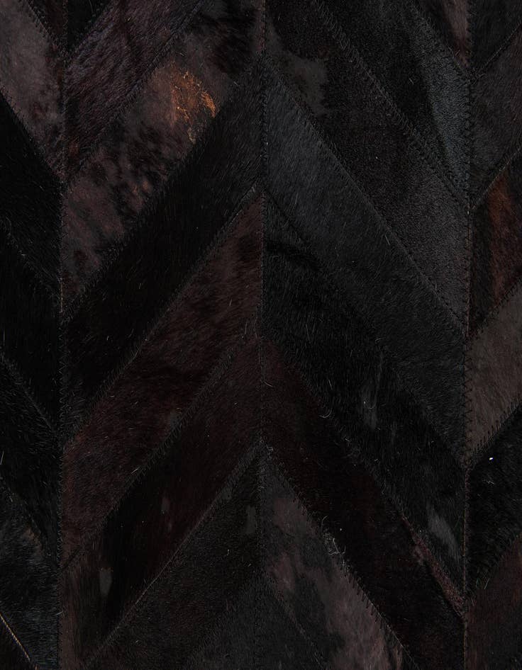 Detail image of  6' x 8' 11 Cowhide Stocks Rug