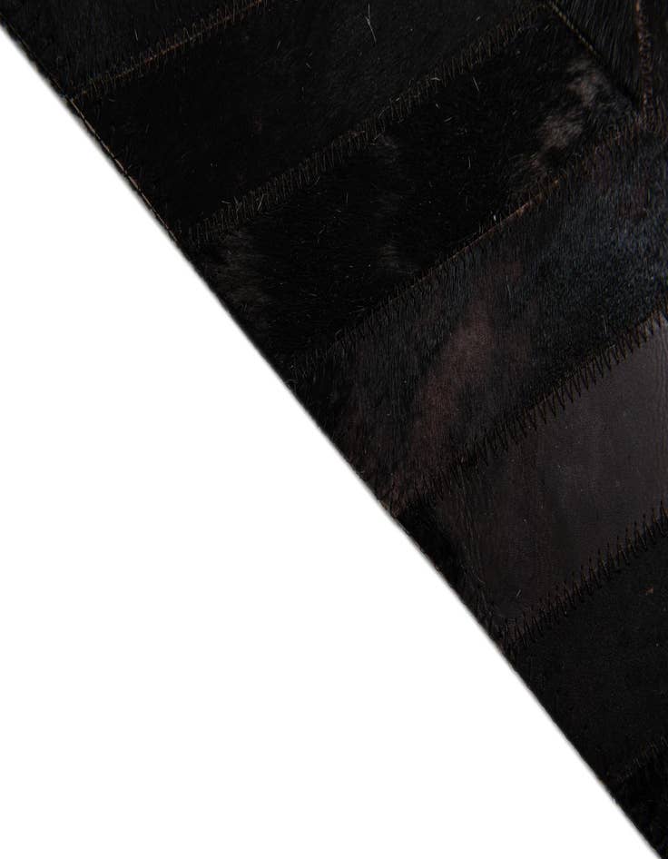 Detail image of  6' x 8' 11 Cowhide Stocks Rug