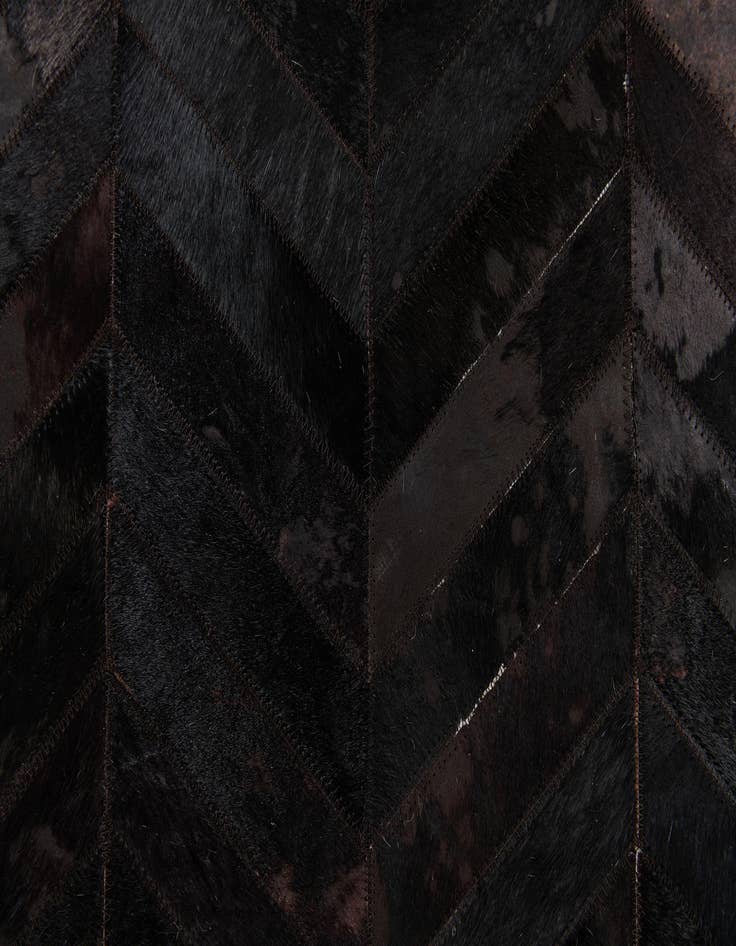 Detail image of  6' x 8' 11 Cowhide Stocks Rug