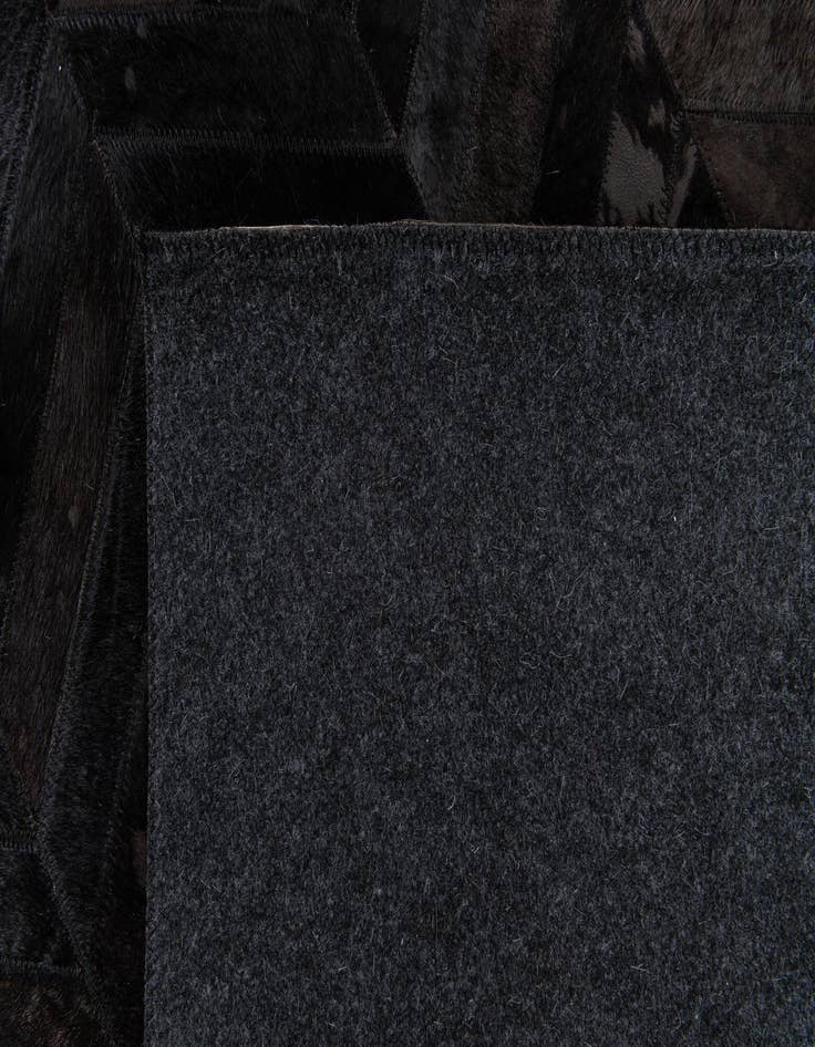 Detail image of  6' x 9' Cowhide Stocks Rug