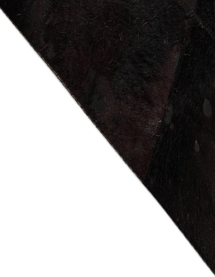Detail image of  6' x 8' 11 Cowhide Stocks Rug
