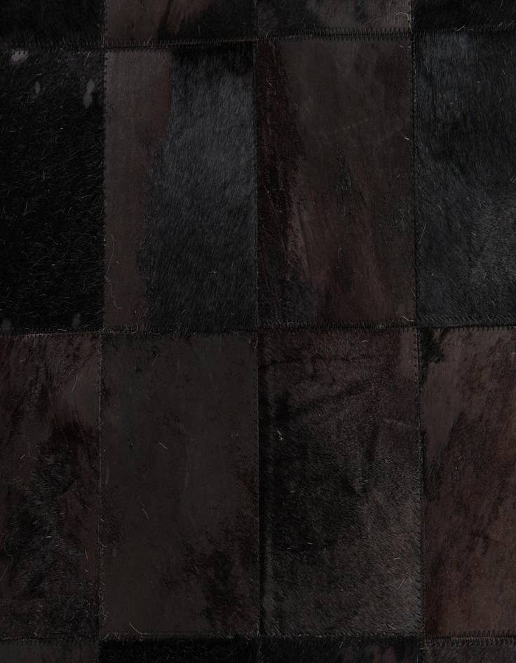 Detail image of  6' x 8' 11 Cowhide Stocks Rug