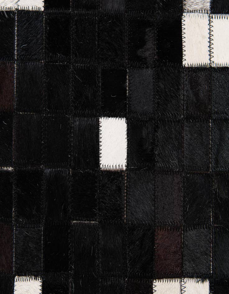 Detail image of  5' 2 x 7' 11 Cowhide Stocks Rug