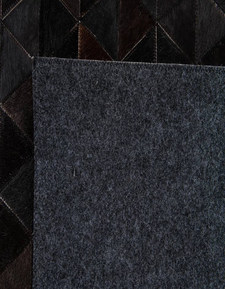 Detail image of  5' 1 x 7' 10 Cowhide Stocks Rug