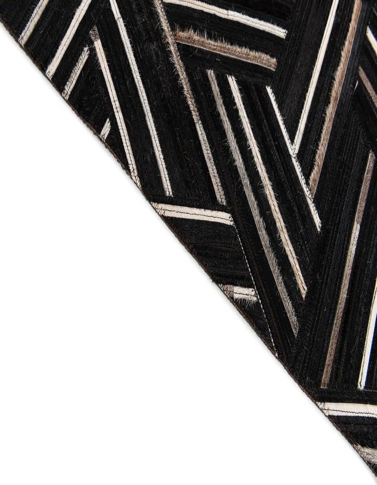 Detail image of  5' 1 x 7' 11 Cowhide Stocks Rug