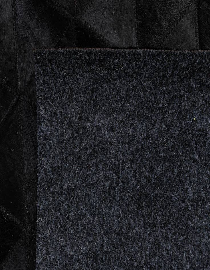 Detail image of  5' x 8' Cowhide Stocks Rug