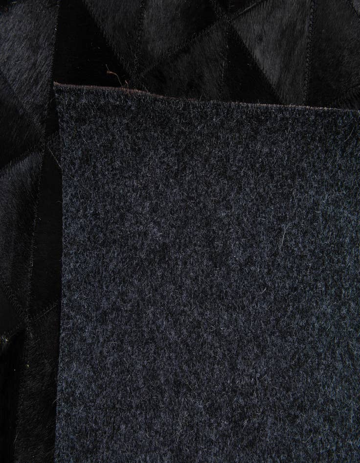 Detail image of  5' 1 x 8' Cowhide Stocks Rug