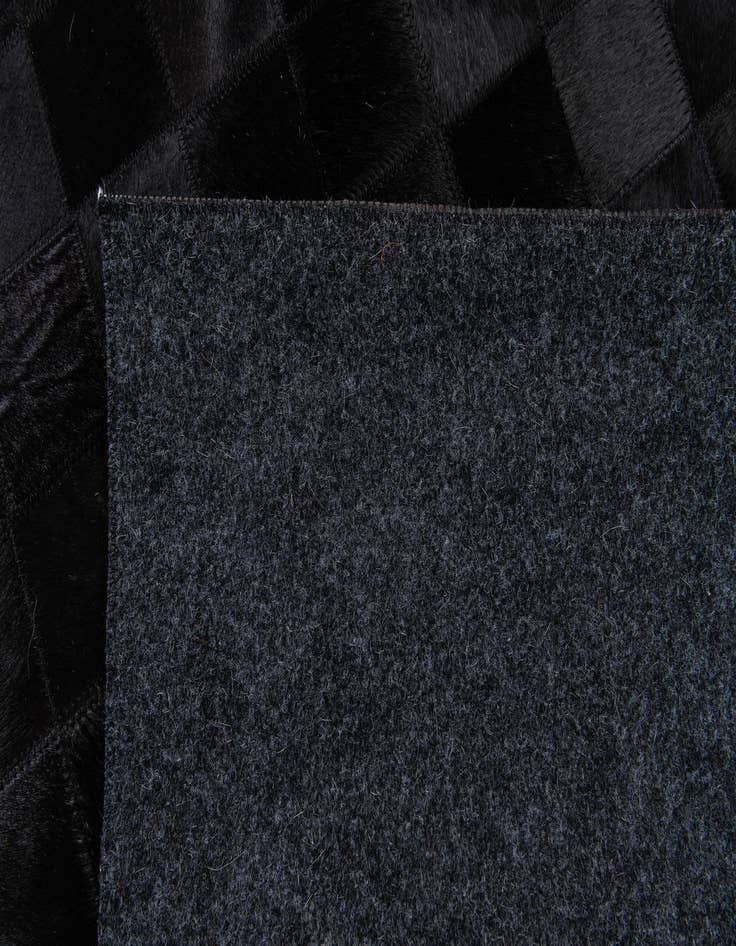 Detail image of  5' x 7' 10 Cowhide Stocks Rug