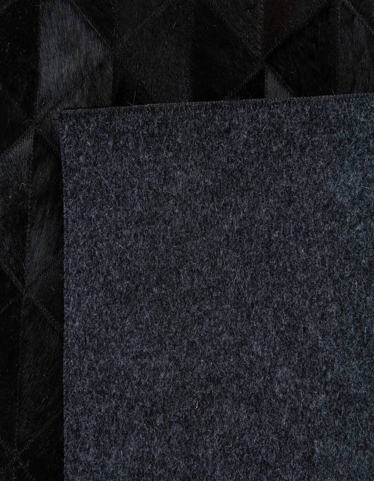 Detail image of  5' x 8' Cowhide Stocks Rug