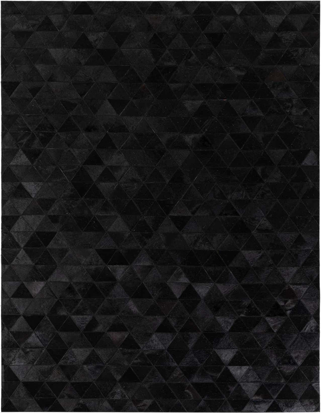A 5x8 rectangular black modern cowhide rug featuring a geometric triangular pattern, ideal for a living room.