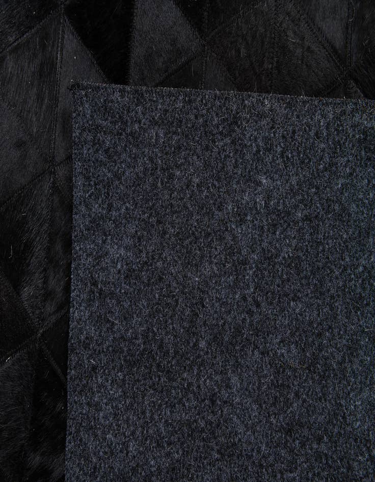 Detail image of  5' x 8' 1 Cowhide Stocks Rug