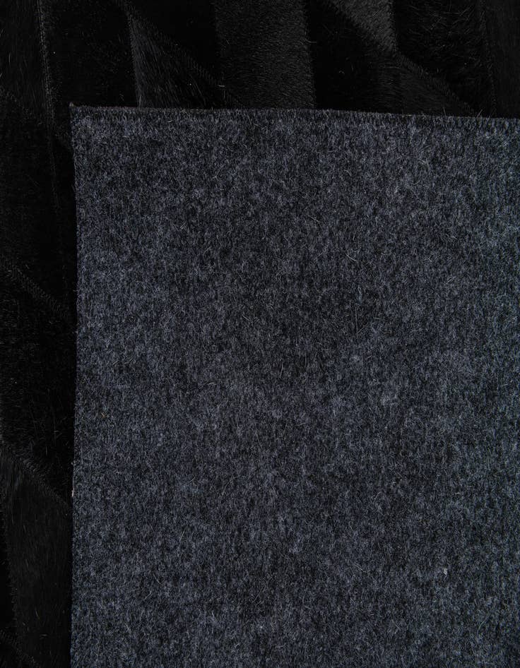 Detail image of  5' 7 x 7' 11 Cowhide Stocks Rug