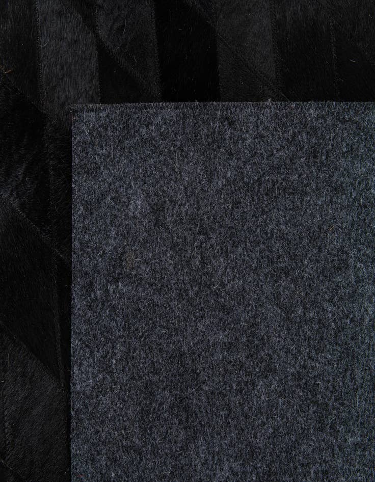 Detail image of  5' 7 x 7' 11 Cowhide Stocks Rug