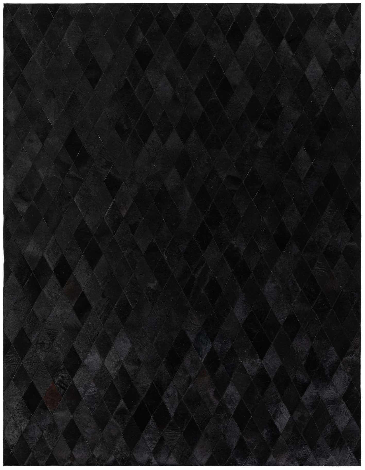 A 5x8 rectangular black modern cowhide rug featuring a diamond patchwork pattern, suitable for a living room.