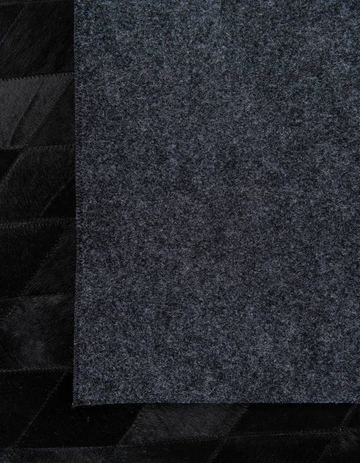 Detail image of  5' 7 x 7' 11 Cowhide Stocks Rug