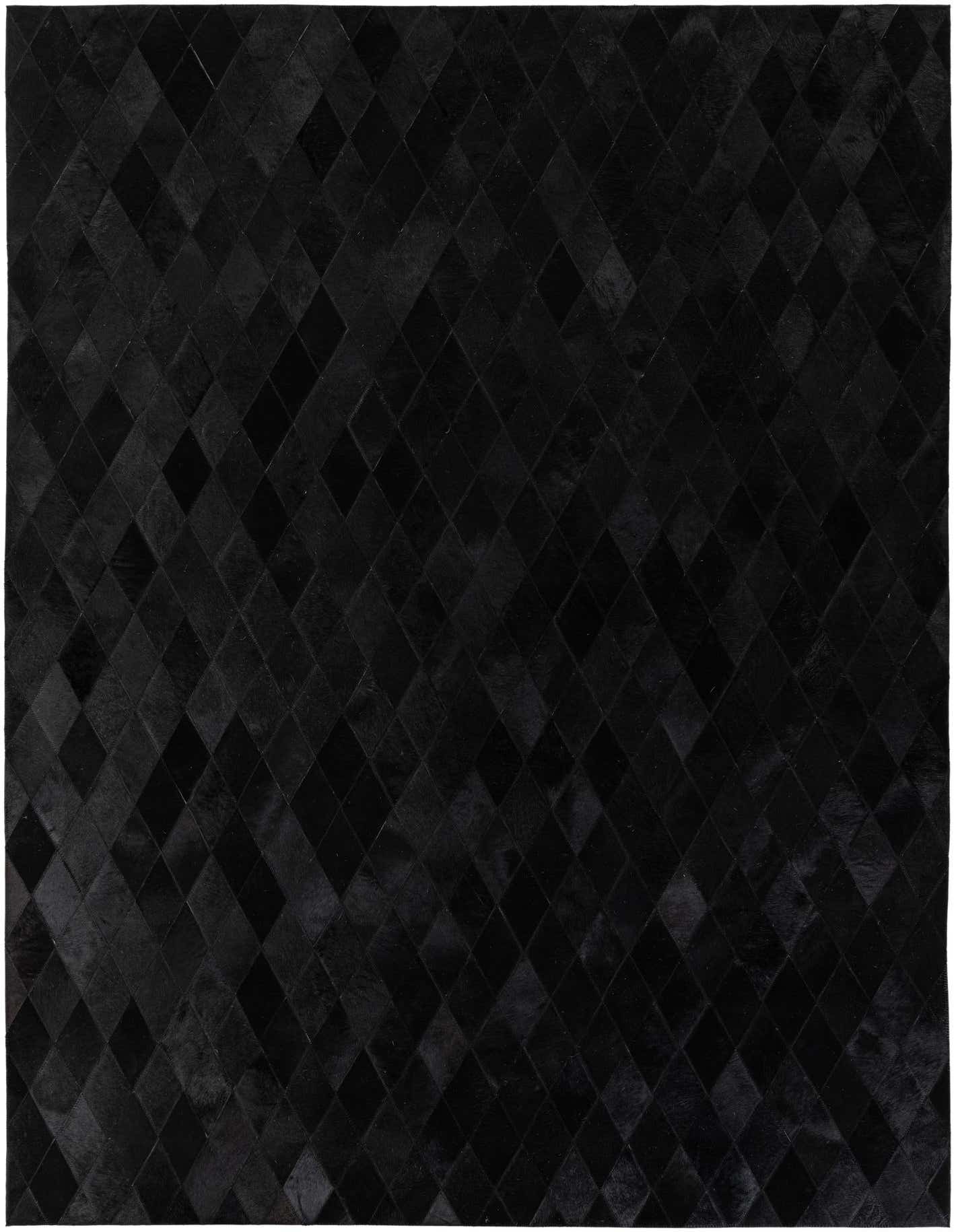 A 5x8 rectangular black modern rug made of cowhide and leather, featuring a subtle geometric diamond pattern.