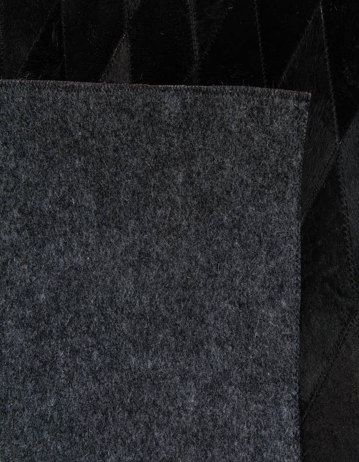 Detail image of  5' 2 x 8' Cowhide Stocks Rug