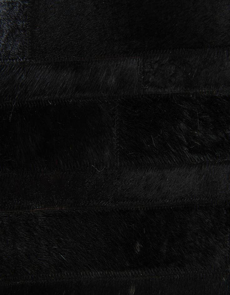 Detail image of  5' x 7' 11 Cowhide Stocks Rug
