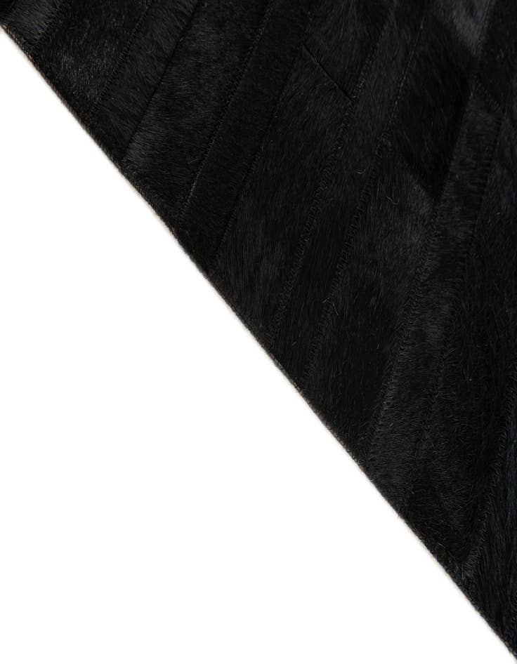 Detail image of  4' 11 x 7' 11 Cowhide Stocks Rug