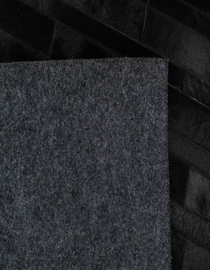 Detail image of  5' x 8' 1 Cowhide Stocks Rug