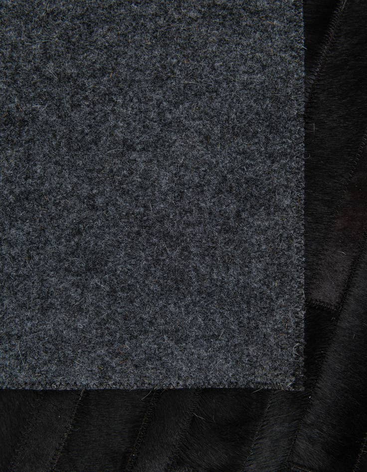 Detail image of  5' x 8' Cowhide Stocks Rug