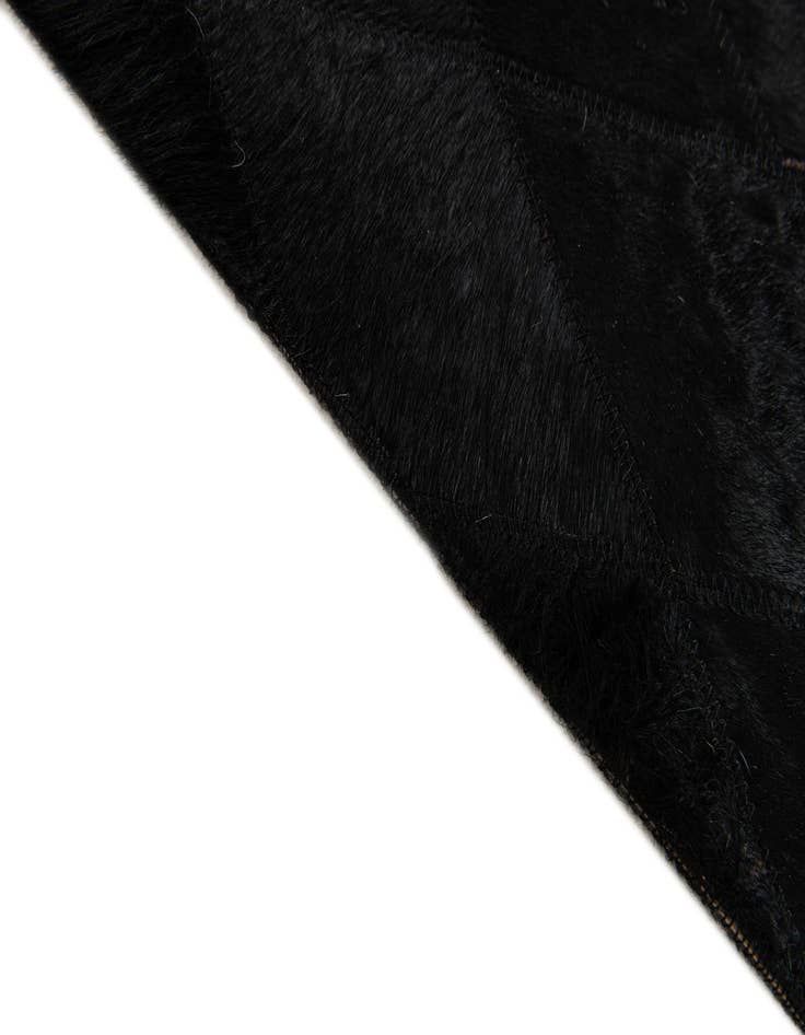 Detail image of  5' 1 x 8' Cowhide Stocks Rug