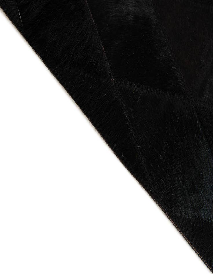 Detail image of  5' 1 x 8' Cowhide Stocks Rug