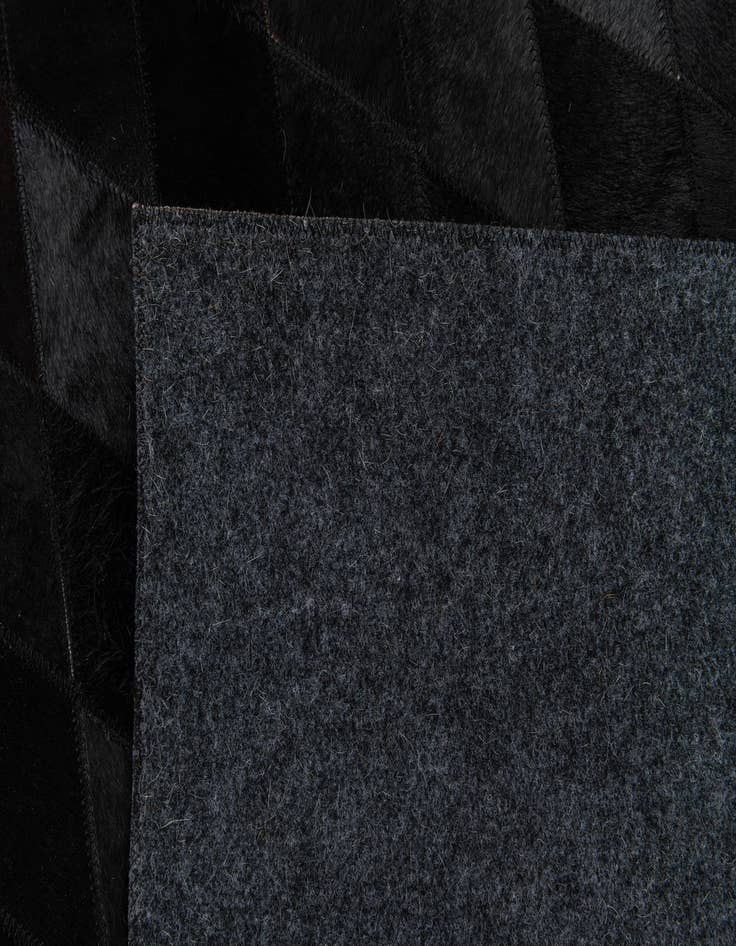 Detail image of  5' 1 x 8' Cowhide Stocks Rug