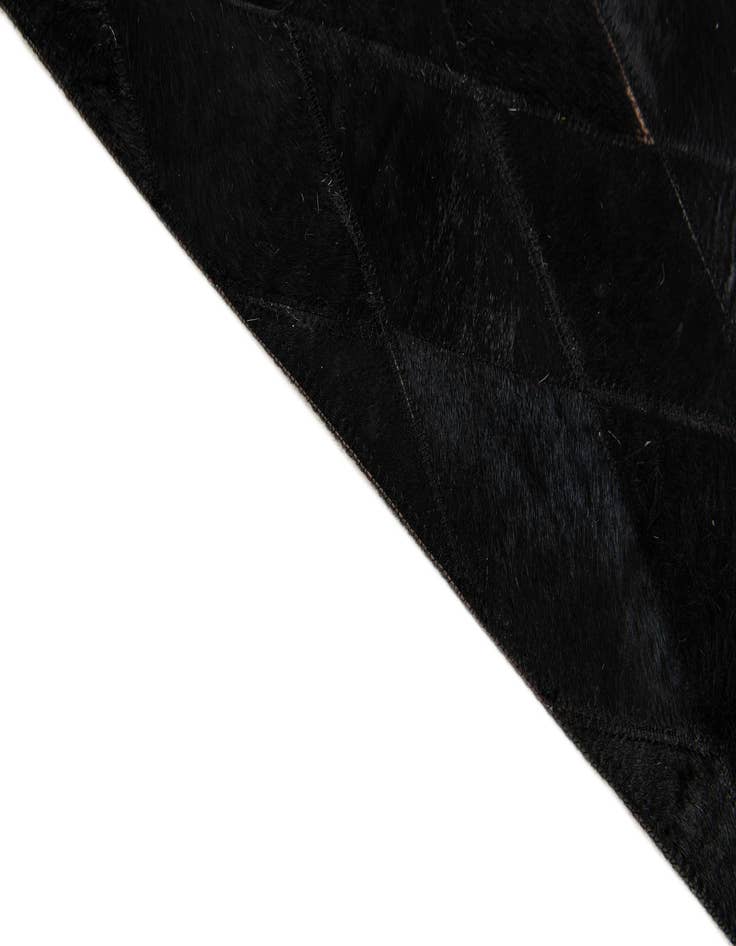 Detail image of  5' 2 x 8' Cowhide Stocks Rug