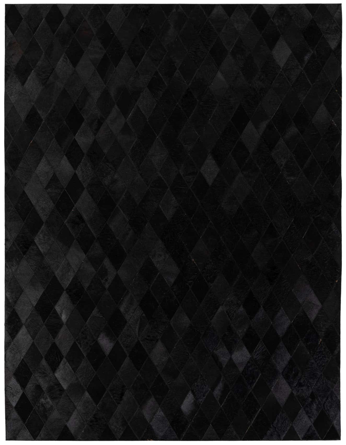 A 5x8 rectangular black modern cowhide rug featuring a geometric diamond pattern, suitable for a living room or bedroom.