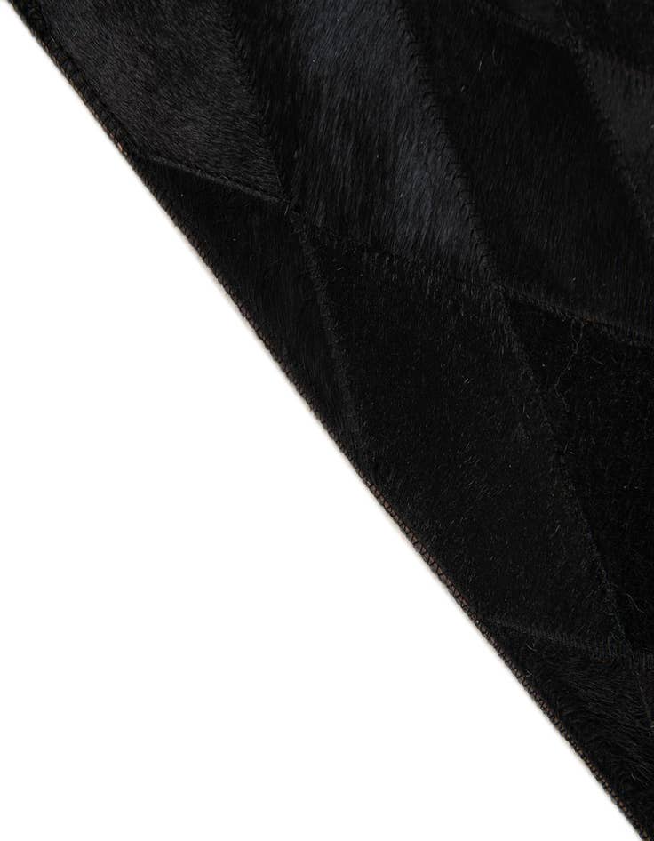 Detail image of  5' 1 x 7' 11 Cowhide Stocks Rug