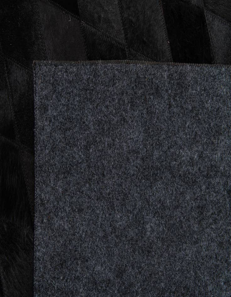 Detail image of  5' 1 x 7' 11 Cowhide Stocks Rug