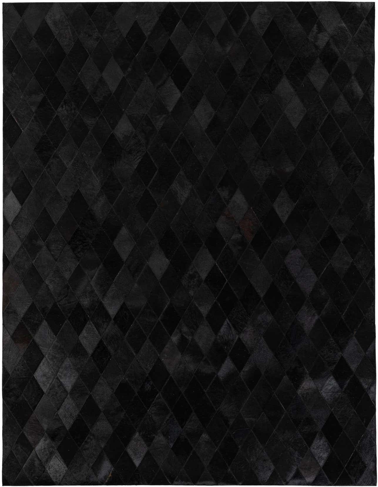 A 5x8 rectangular black modern rug made from cowhide and leather, featuring a geometric diamond pattern.