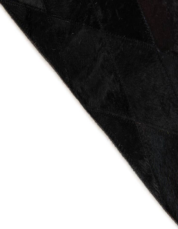Detail image of  5' 2 x 7' 11 Cowhide Stocks Rug