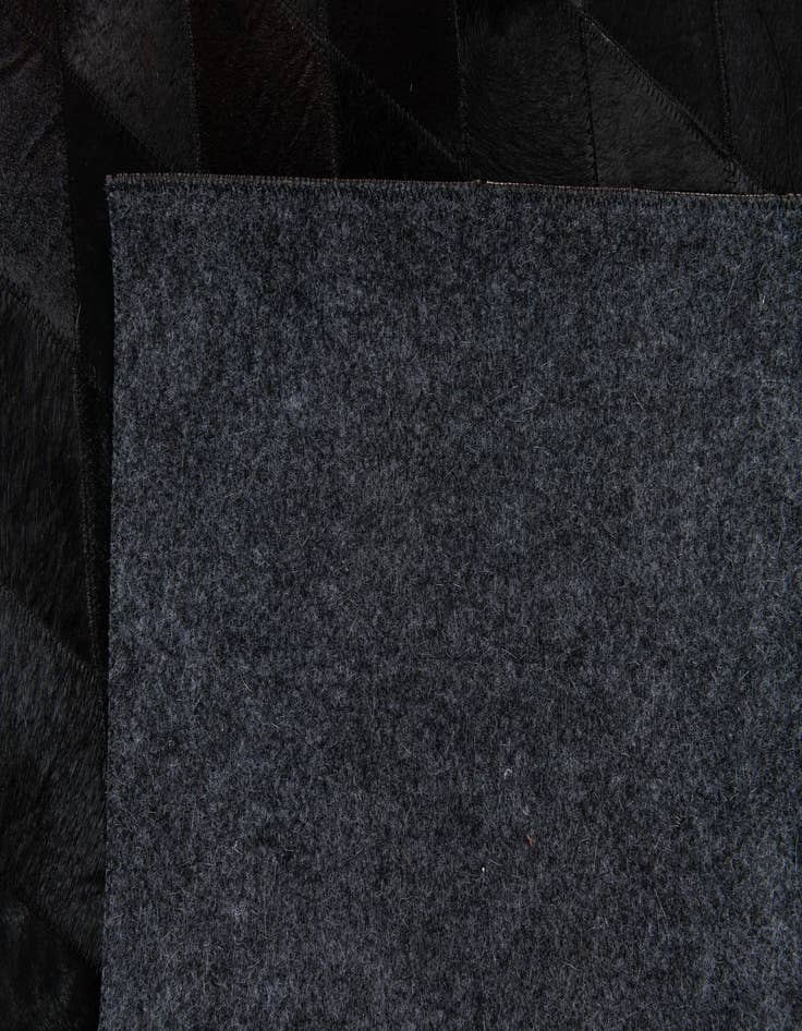 Detail image of  5' 2 x 8' Cowhide Stocks Rug