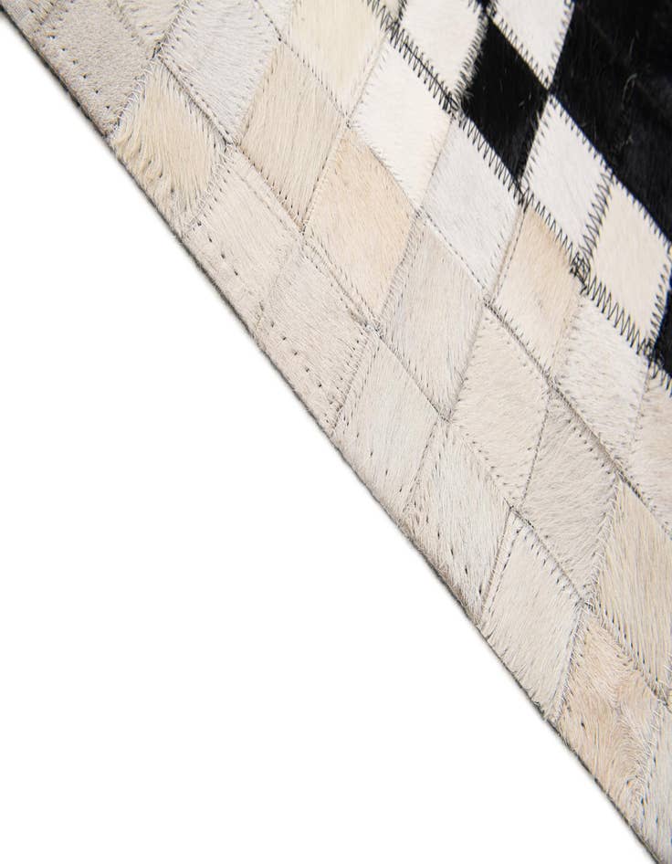 Detail image of  5' 2 x 7' 11 Cowhide Stocks Rug