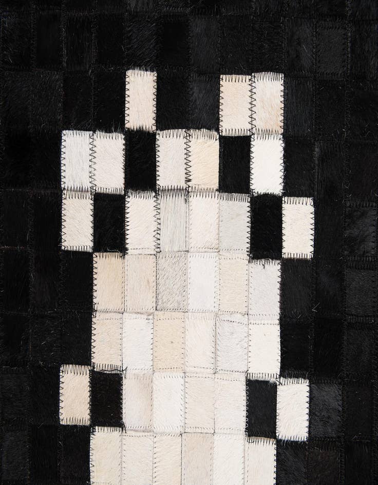 Detail image of  5' 2 x 7' 11 Cowhide Stocks Rug
