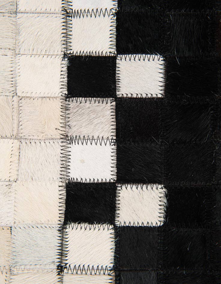 Detail image of  5' 2 x 7' 11 Cowhide Stocks Rug