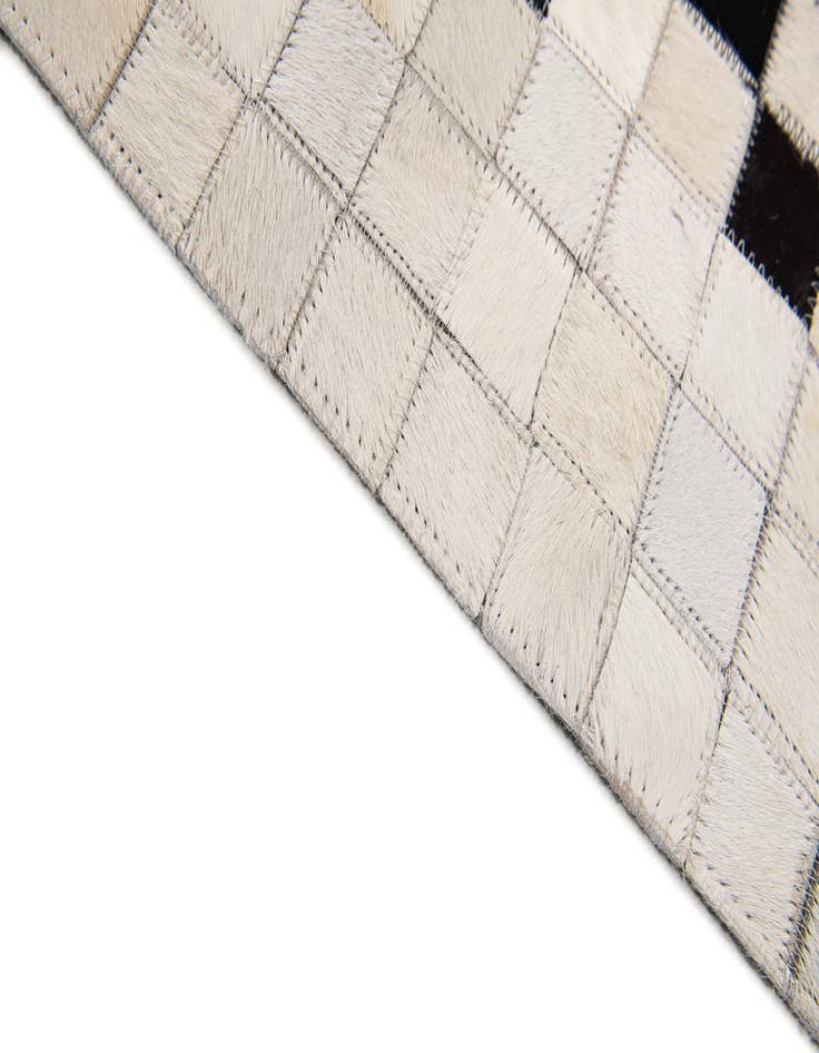 Detail image of  4' 11 x 7' 11 Cowhide Stocks Rug