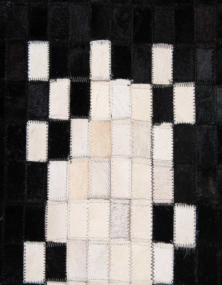 Detail image of  4' 11 x 7' 11 Cowhide Stocks Rug