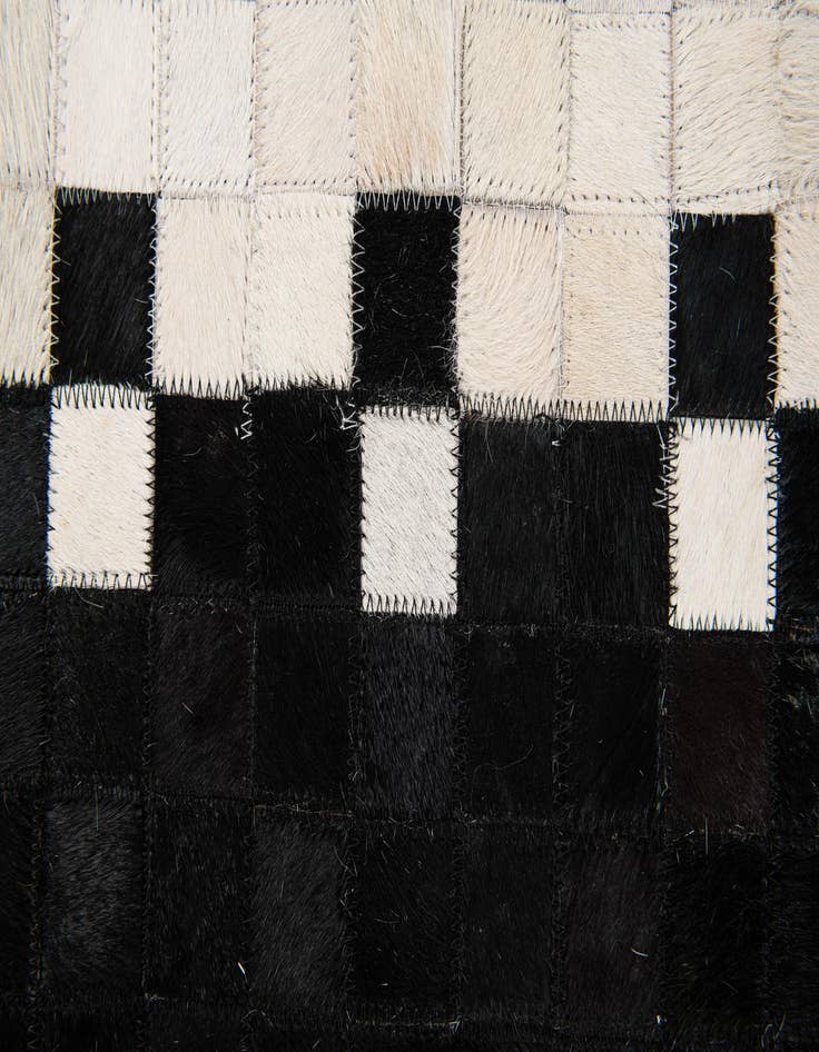 Detail image of  4' 11 x 7' 11 Cowhide Stocks Rug