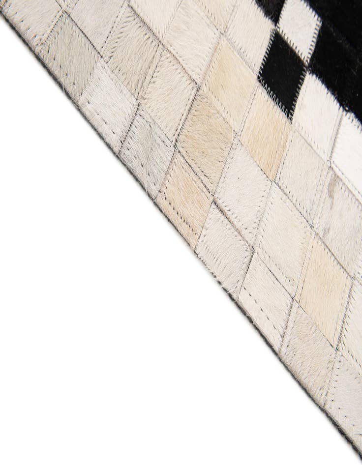 Detail image of  5' 2 x 8' 1 Cowhide Stocks Rug
