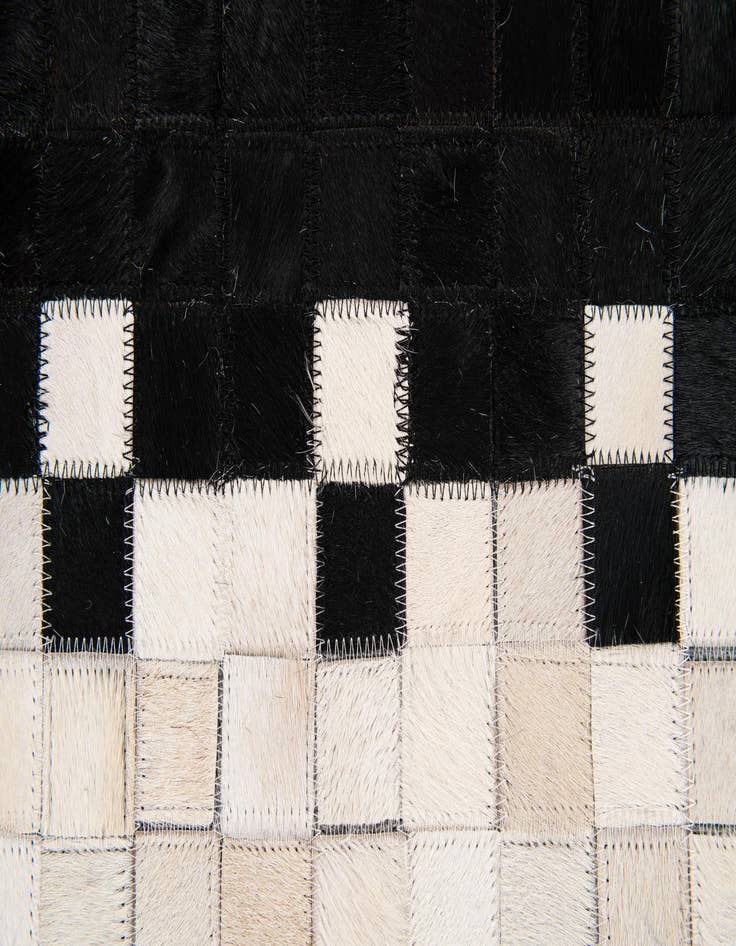 Detail image of  5' 2 x 8' 1 Cowhide Stocks Rug