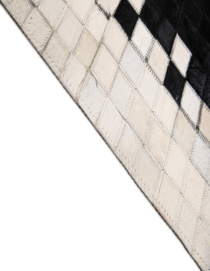 Detail image of  5' 1 x 7' 11 Cowhide Stocks Rug