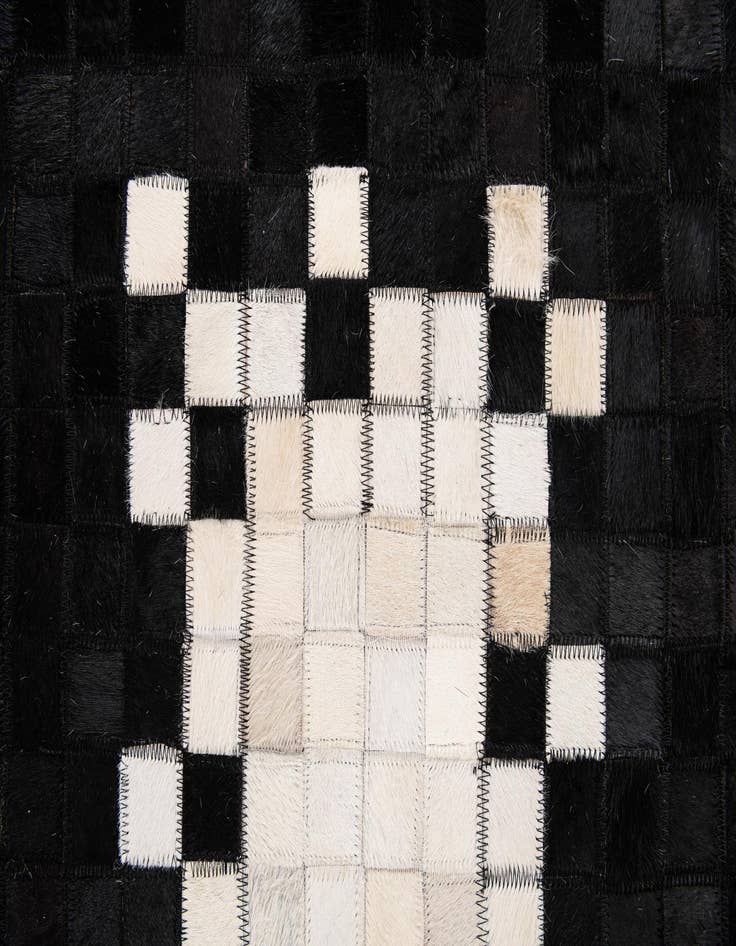 Detail image of  5' 1 x 7' 11 Cowhide Stocks Rug