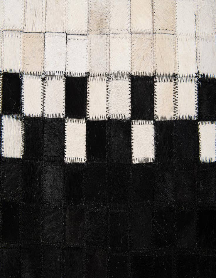 Detail image of  5' 1 x 7' 11 Cowhide Stocks Rug