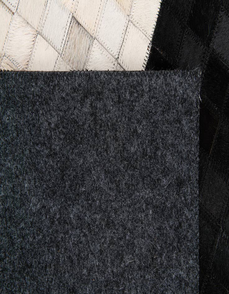 Detail image of  5' x 8' Cowhide Stocks Rug